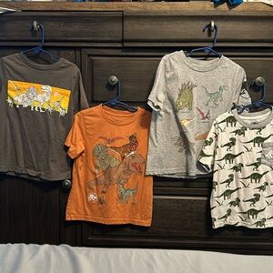 Set of 4 Boys size 5 Jurassic World Tshirts.